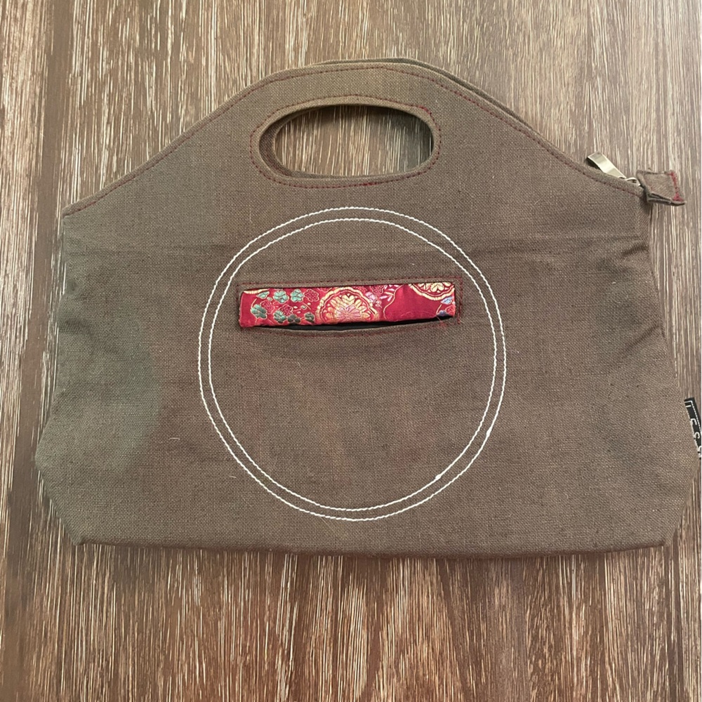 Brown Hand Bag with Maroon Accent and White Stitch
